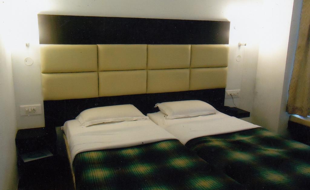 Hotel New Rajdarshan Madikeri Værelse billede