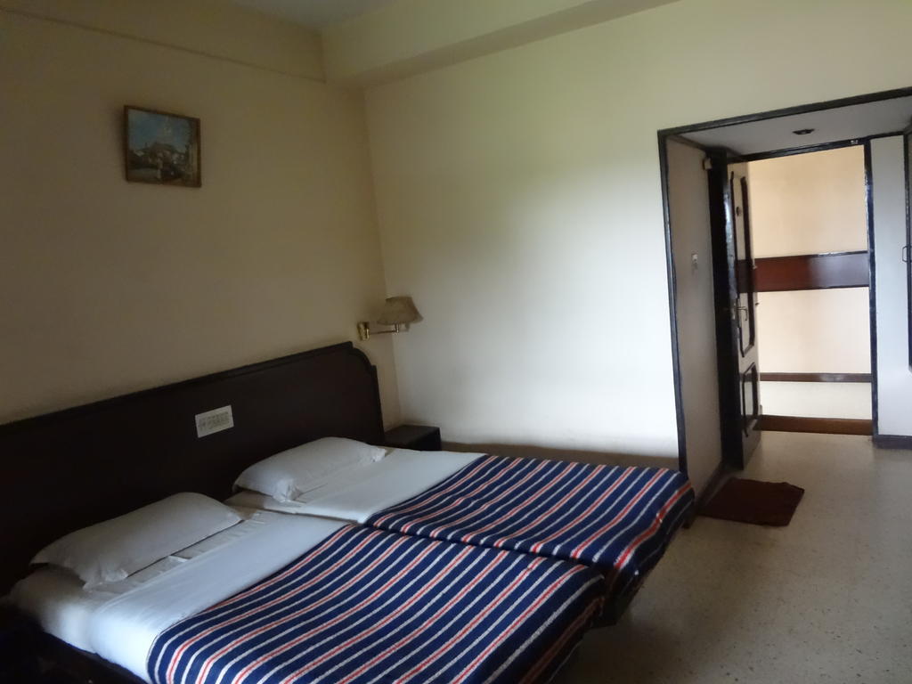 Hotel New Rajdarshan Madikeri Værelse billede